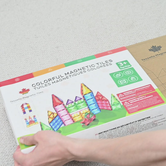 Unboxing video of Tessella Master Set – 106 Piece Magnetic Tiles, Canadian STEM educational toy for kids ages 3+, showing retail packaging and contents.