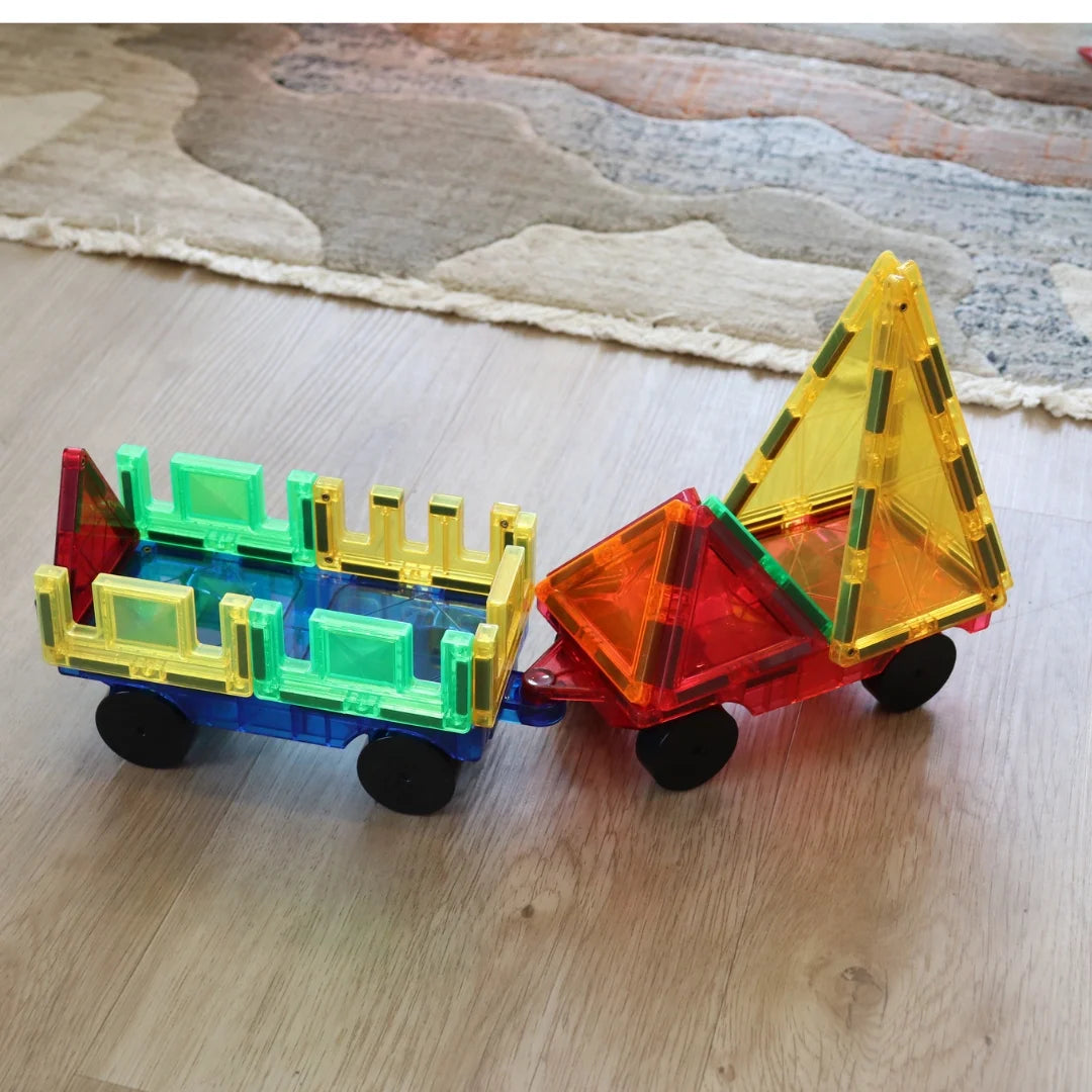 Tessella Magnetic Tiles Car Base Set – 2 Pack with Wheels shown in colorful vehicle builds using magnetic tiles, STEM toy accessory for kids, compatible with Tessella, Connetix, PicassoTiles and Magna-Tiles
